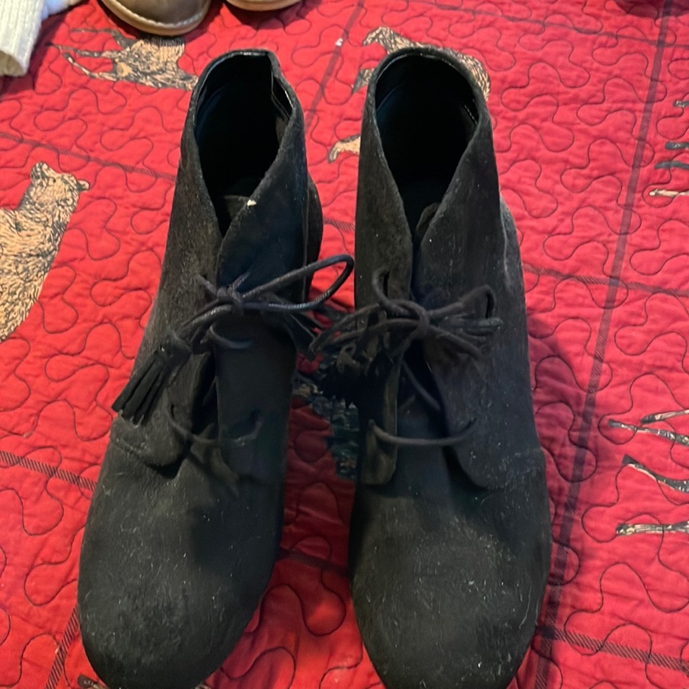 Cute black booties with fringe ties